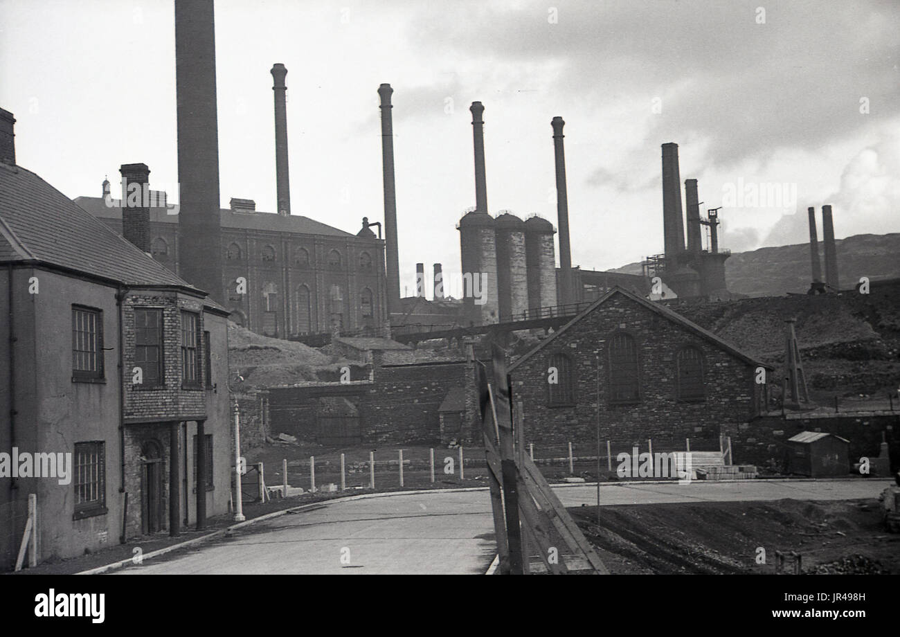 1940s, historical, picture shows the old Dowlais Ironworks on the hillside overlooking Merthyr Tydfil awaiting demolition. Stock Photo