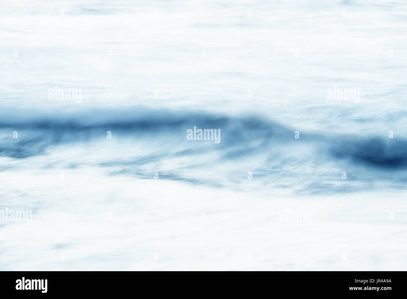 Abstract, blurry water, high key background texture image. Stock Photo