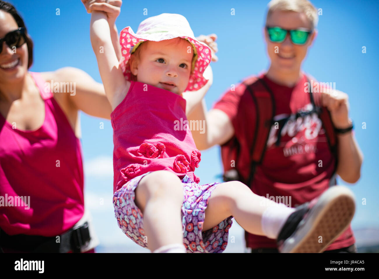 Mother, father, and toddler on a fun desert hike Stock Photo