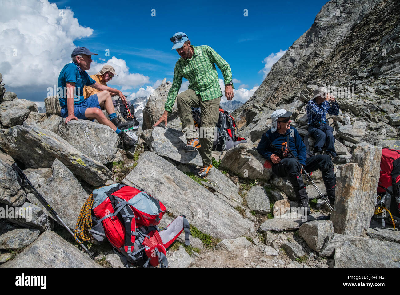 Trekking in the Zillertal seen here with mountaineers near the Greizer Hut mountain refuge Stock Photo