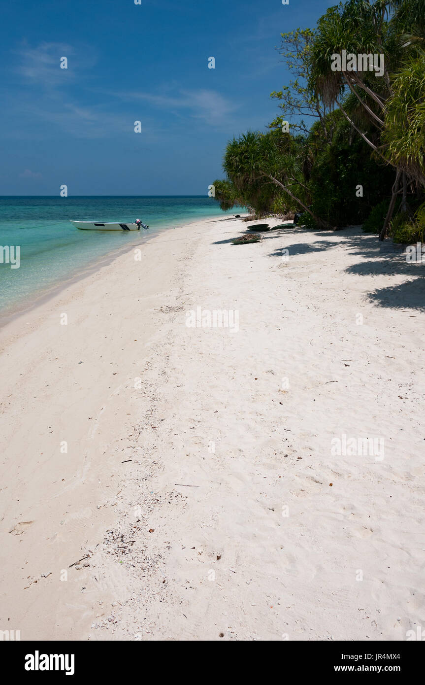 White coral sand beach on the island of Lankaya, Malaysia Stock Photo