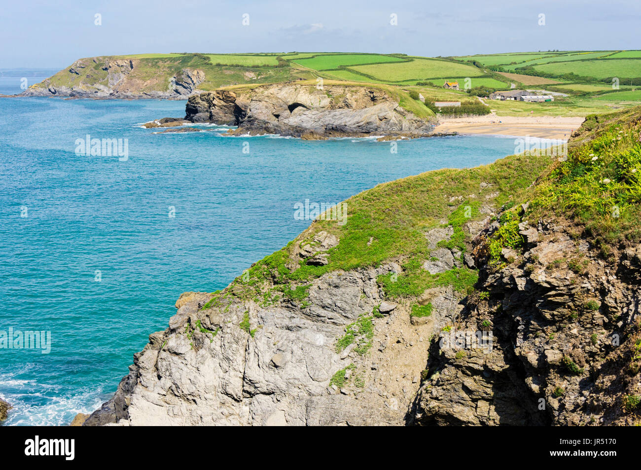 Cliffs and headland looking along the coastline towards Gunwalloe Beach, Lizard Peninsula, Cornwall, UK Stock Photo