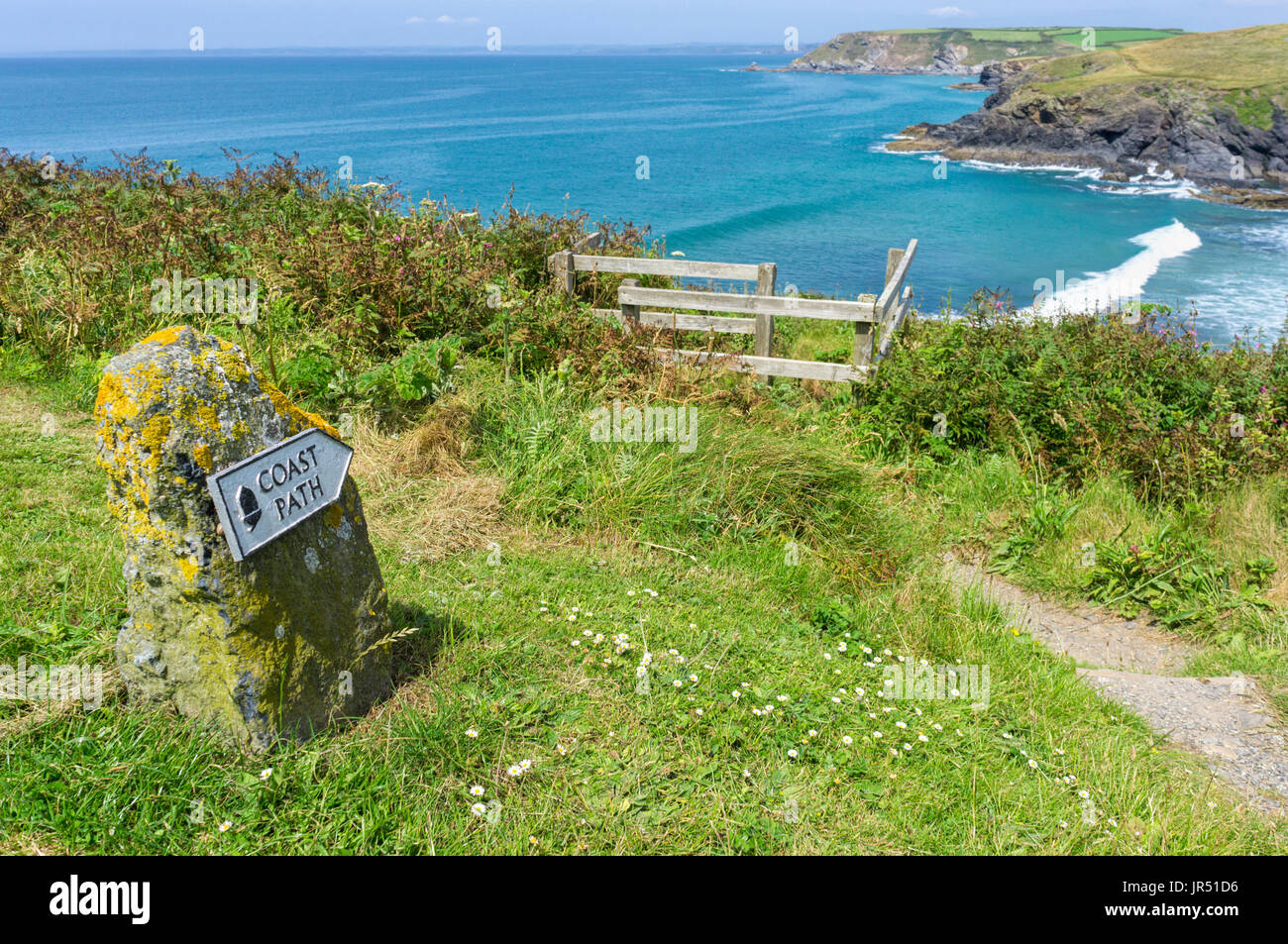 Coast Path sign on the South West Coast Path at Poldhu Beach, Lizard Peninsula, Cornwall, UK Stock Photo