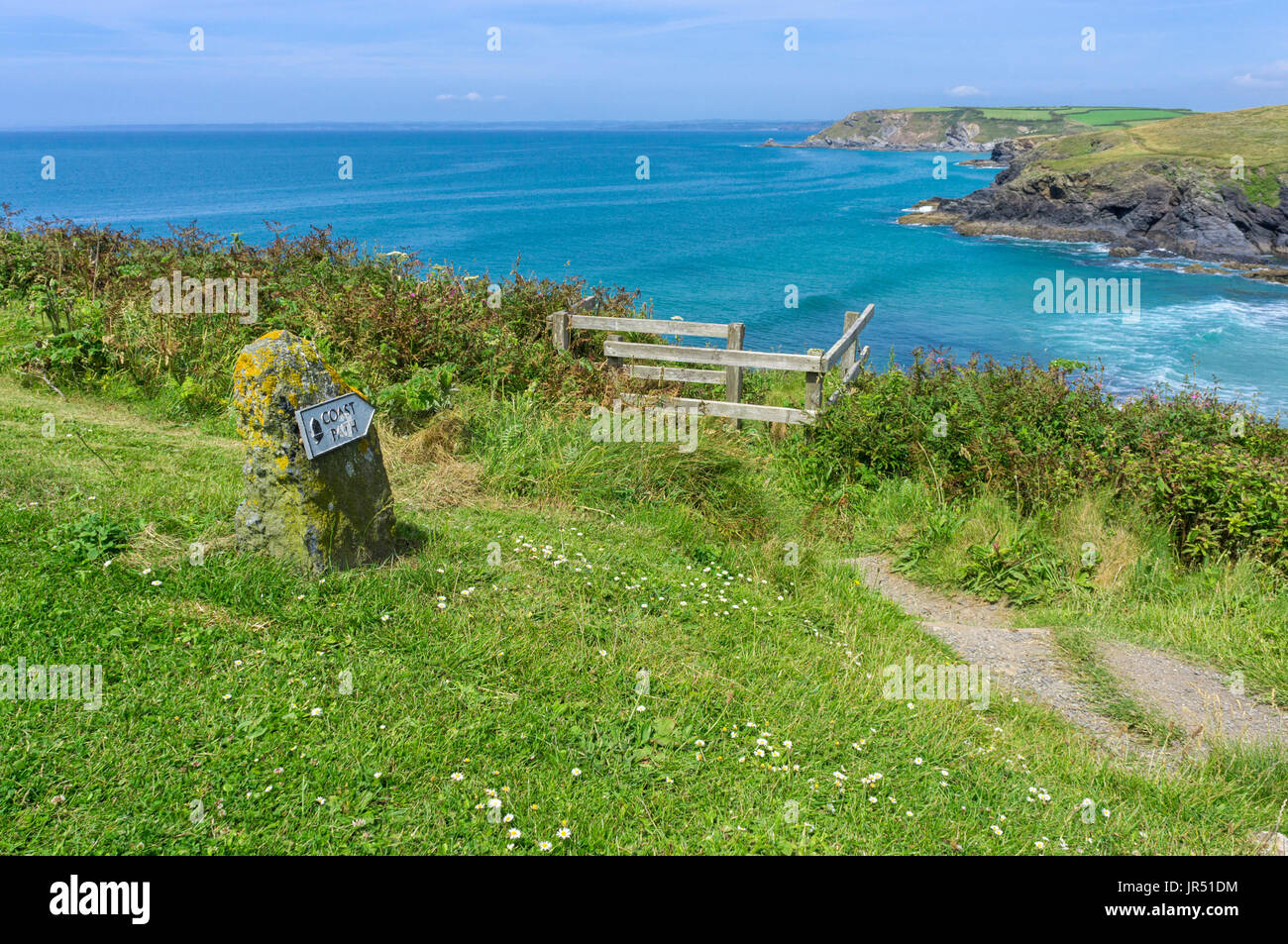 Coast Path sign on the South West Coast Path at Poldhu Beach, Lizard Peninsula, Cornwall, UK Stock Photo