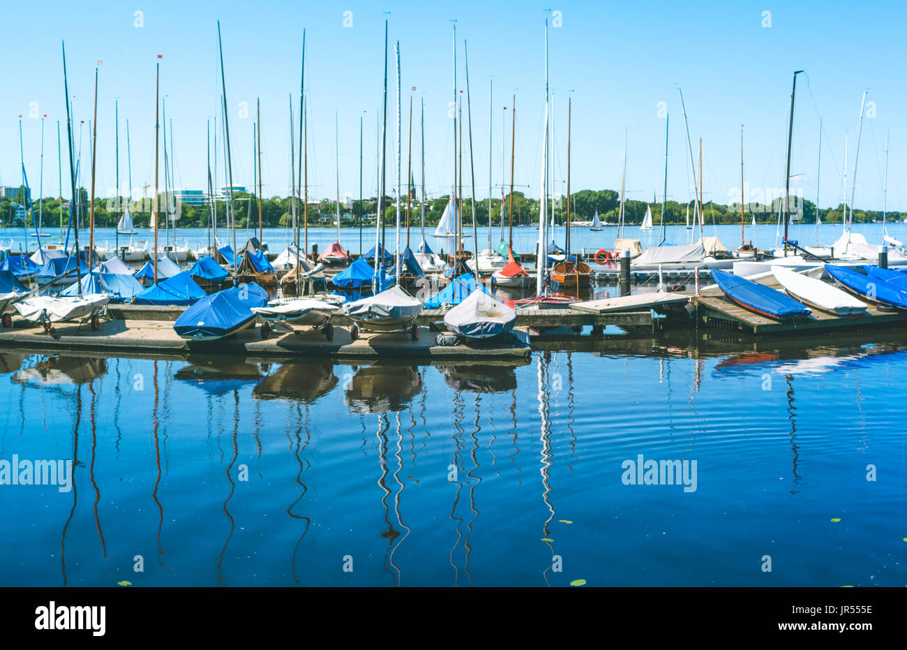Sail boars for rent on the pier on Alster lake. Hamburg, Germany Stock