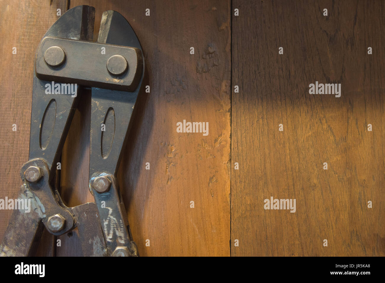a big spanner on the oil wood background Stock Photo