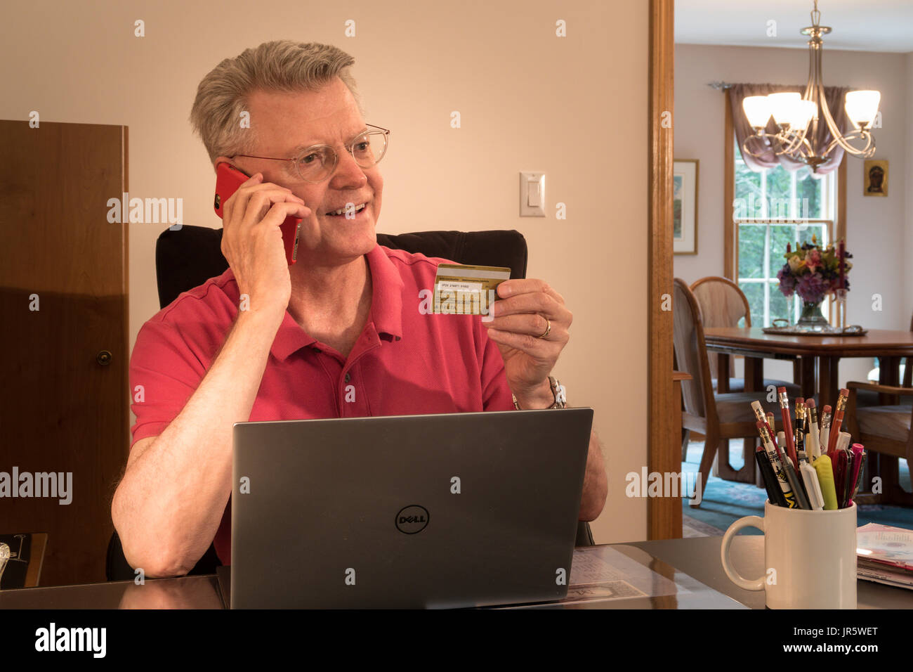 Senior Man at His Home Office, USA Stock Photo