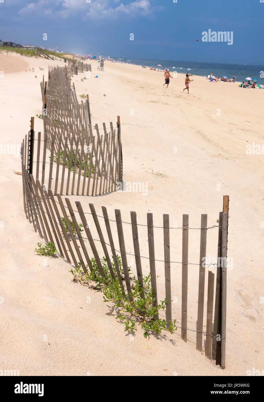 Beachfront fence used to prevent drifting sand and beach erosion in Sea Girt, New Jersey, United States. Stock Photo