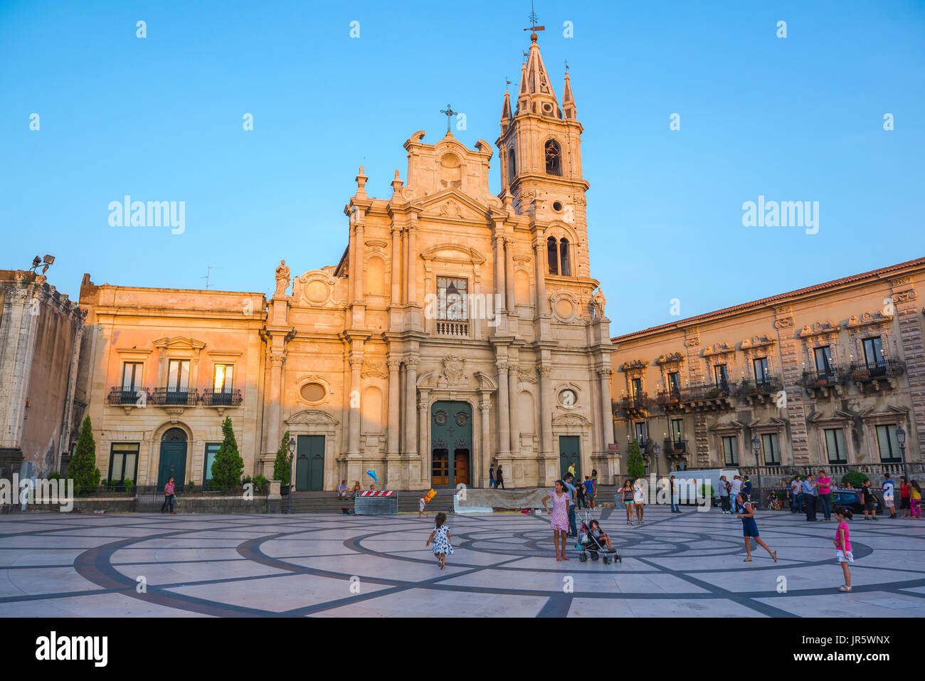 Sicily piazza children, view of children at play in the historic Piazza Duomo in Acireale, near Catania, Sicily. Stock Photo