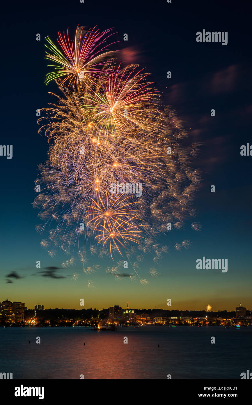 Canada's 150th. anniversary was celebrated by a spectacular fireworks display over Kempenfelt Bay in Barrie, Ontario, Canada on July 1, 2017. Stock Photo