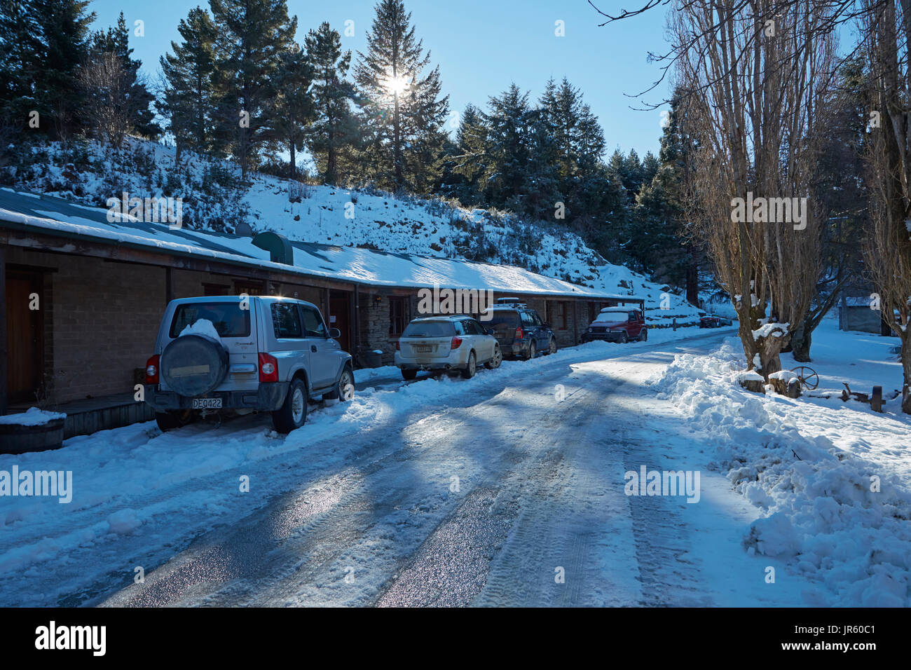 Danseys Pass Coach Inn (1862) and winter snow, Danseys Pass, Central Otago, South Island, New Zealand Stock Photo