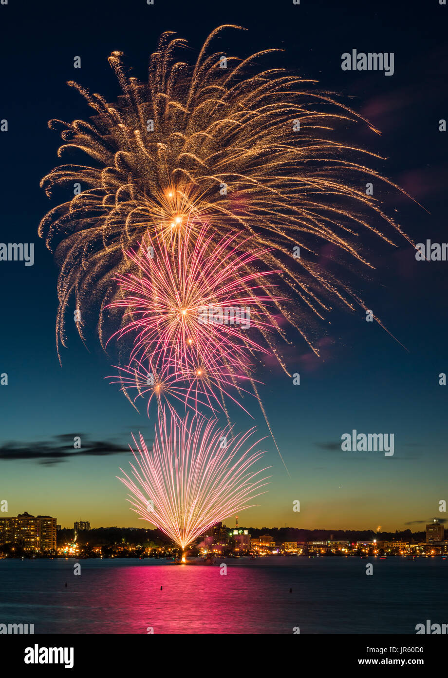 Canada's 150th. anniversary was celebrated by a spectacular fireworks display over Kempenfelt Bay in Barrie, Ontario, Canada on July 1, 2017. Stock Photo