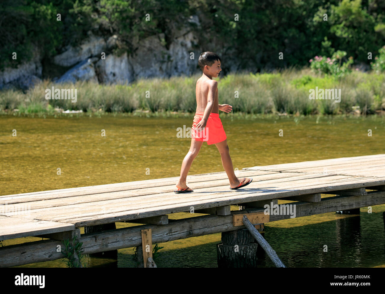 Kids walking wood bridge hi-res stock photography and images - Alamy