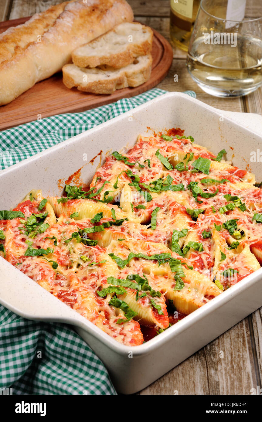 pasta conchiglioni shells stuffed meat mince with spinach and tomato