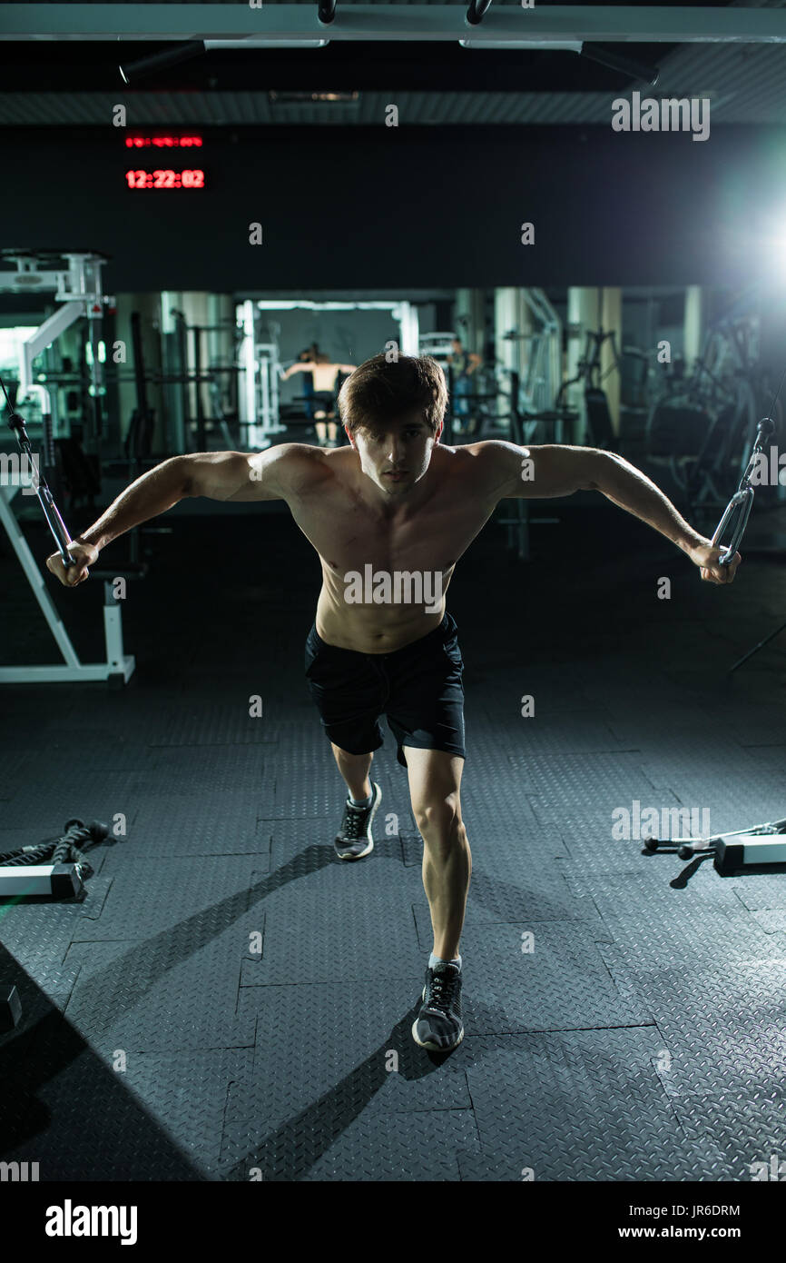 Strong handsome man exercising hi-res stock photography and images - Alamy