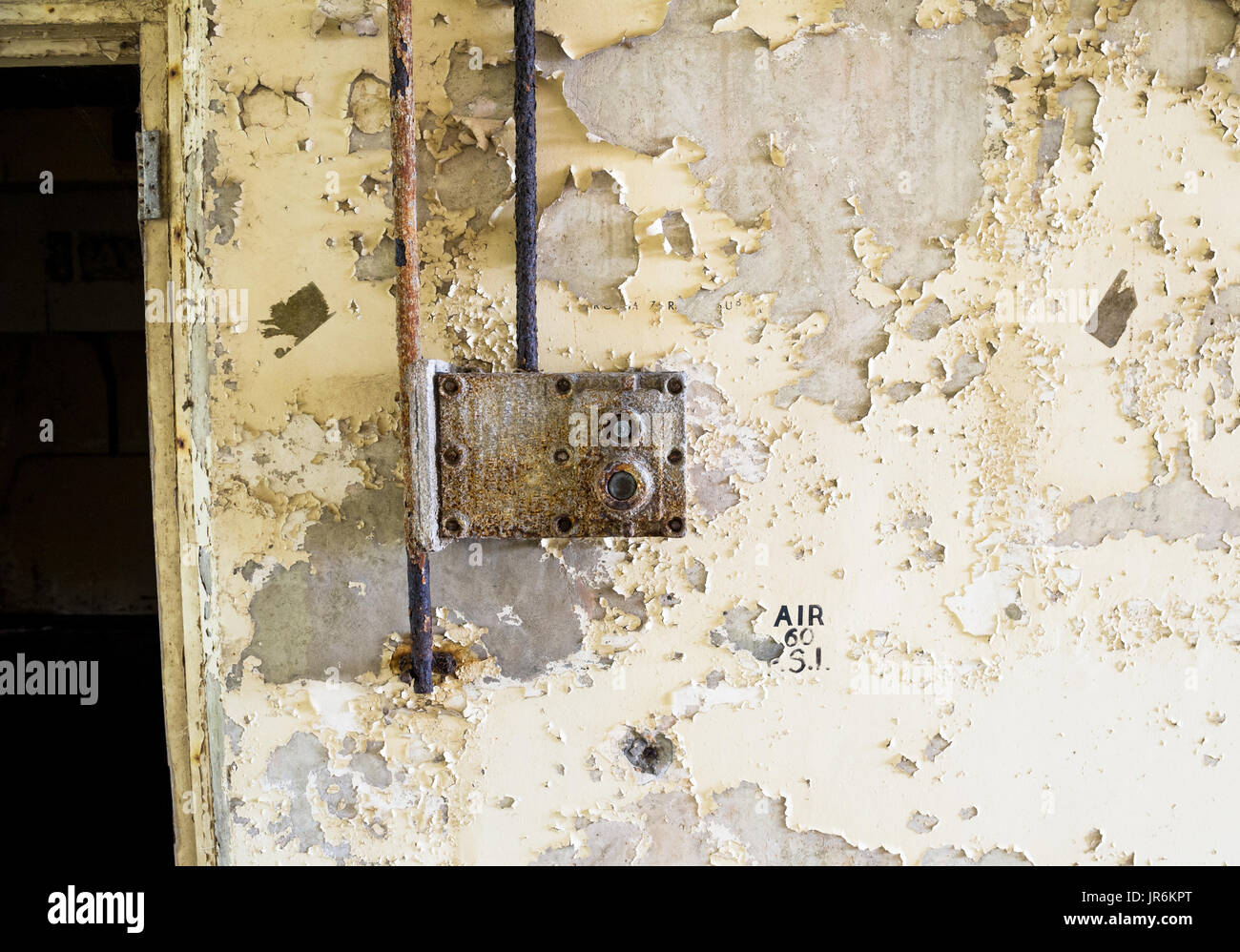 Gas proof wall mounted switchgear at the abandoned A.W.R.E. site on Orford Ness, Suffolk. Stock Photo