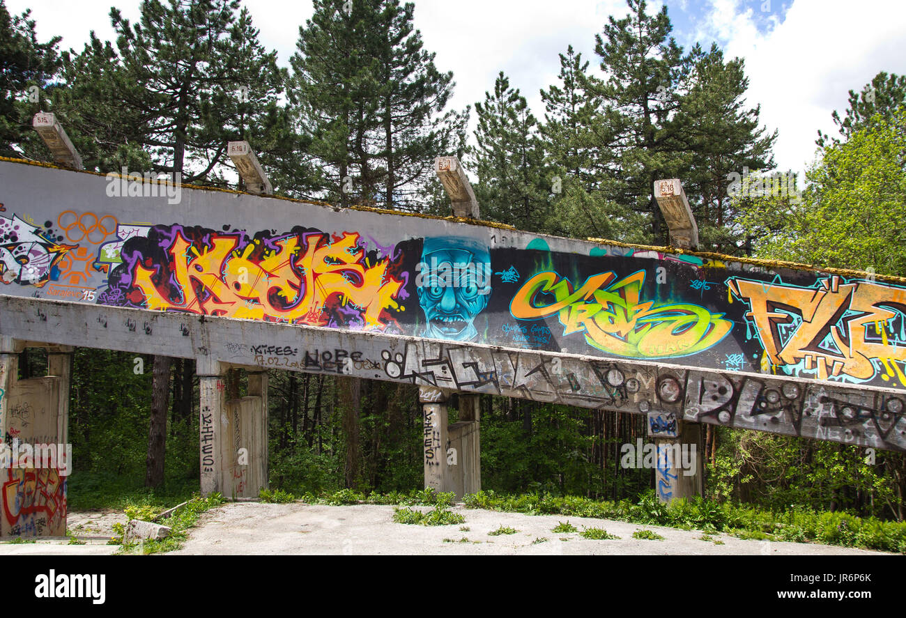 a section of the sarajevo bobsleigh track covered in graffiti Stock Photo