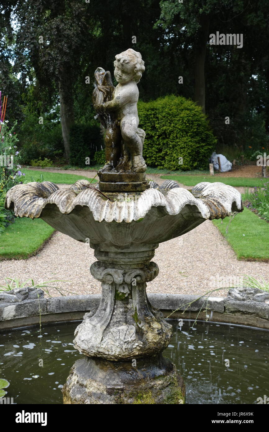 statue in garden Stock Photo Alamy