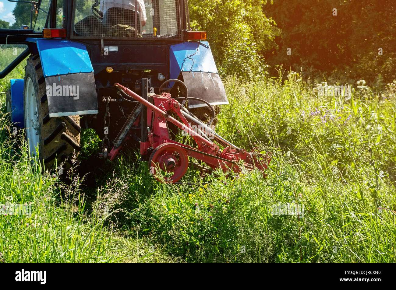 Mowing a meadow hi-res stock photography and images - Alamy