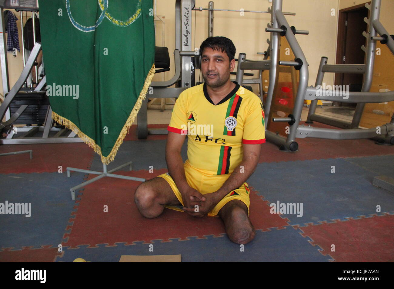 Former Afghan soldier Matiullah trains for the Invictus Games in Canada in a sports hall of the Afghan Army in Kabul, Afghanistan, 20 July 2017. The Invictus Games are a large sporting event for wounded soldiers from around the world. He is one of the eight men that were selected out of thousands of injured soldiers to represent Afghanistan in the event. Matiullah was injured in 2009 in Kandahar province in southern Afghanistan. He stepped on a mine laid by the Taliban during a patrol on foot. When a medic came to help him the Taliban detonated a second charge which tore apart his second leg. Stock Photo