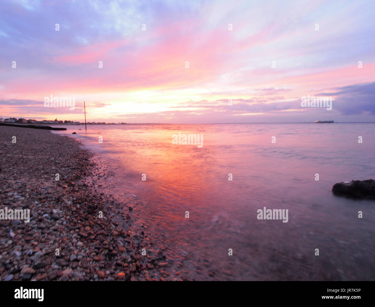 Sheerness, Kent. 04 Aug, 2017. UK Weather: a stunning sunset at Sheerness. Credit: James Bell/Alamy Live News Stock Photo