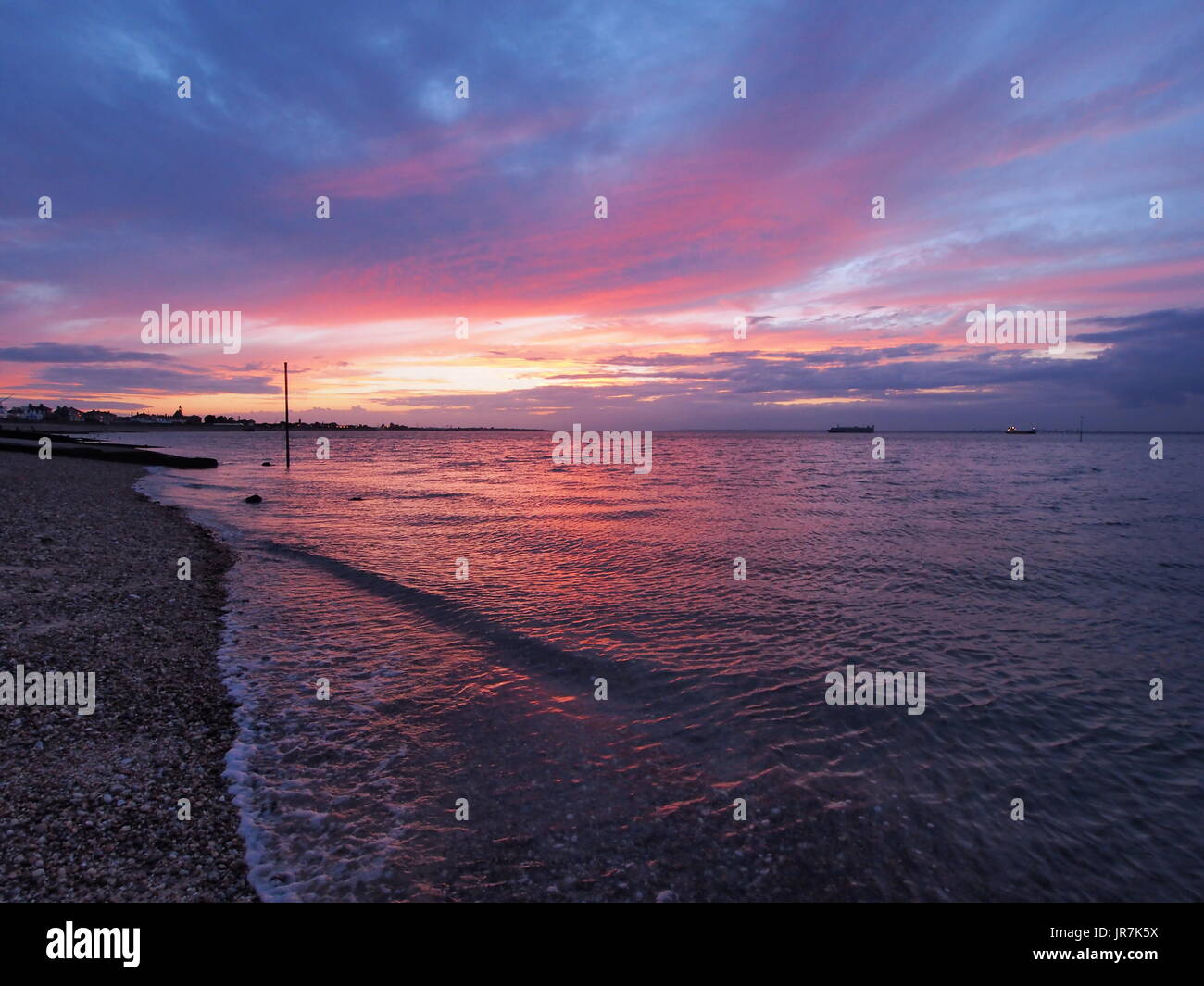 Sheerness, Kent. 04 Aug, 2017. UK Weather: a stunning sunset at Sheerness. Credit: James Bell/Alamy Live News Stock Photo