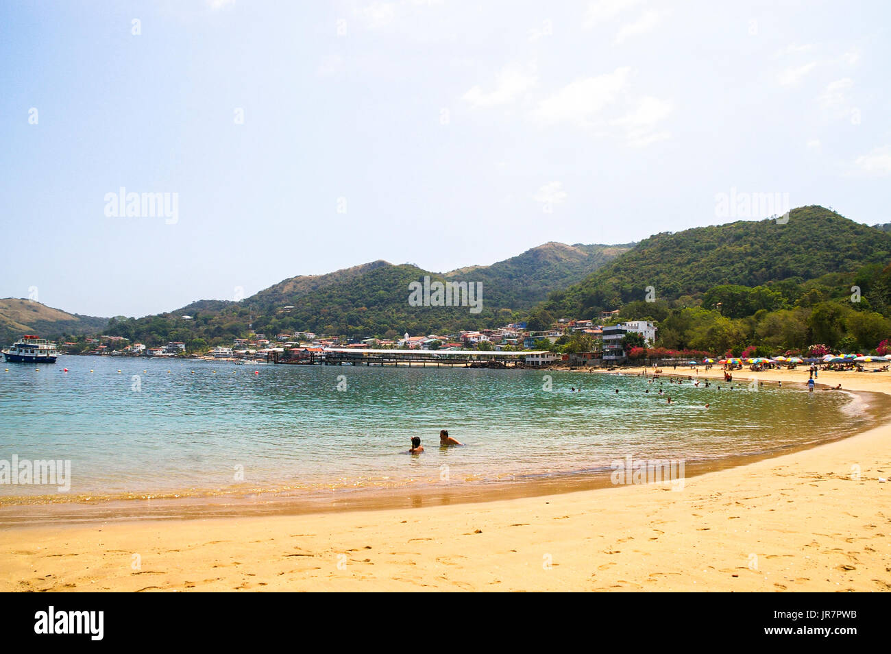 A few people on the beach at Taboga Island also known as Island of Flowers is a tourist destination in the Gulf of Panama Stock Photo
