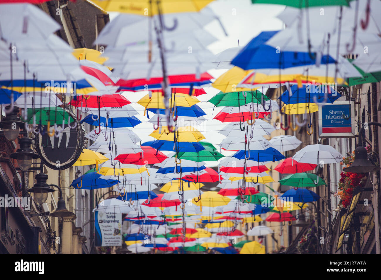 Slaney street in Enniscorthy Ireland decorated with floating umbrellas for the Rockin` Food Festival August Bank Holiday Stock Photo