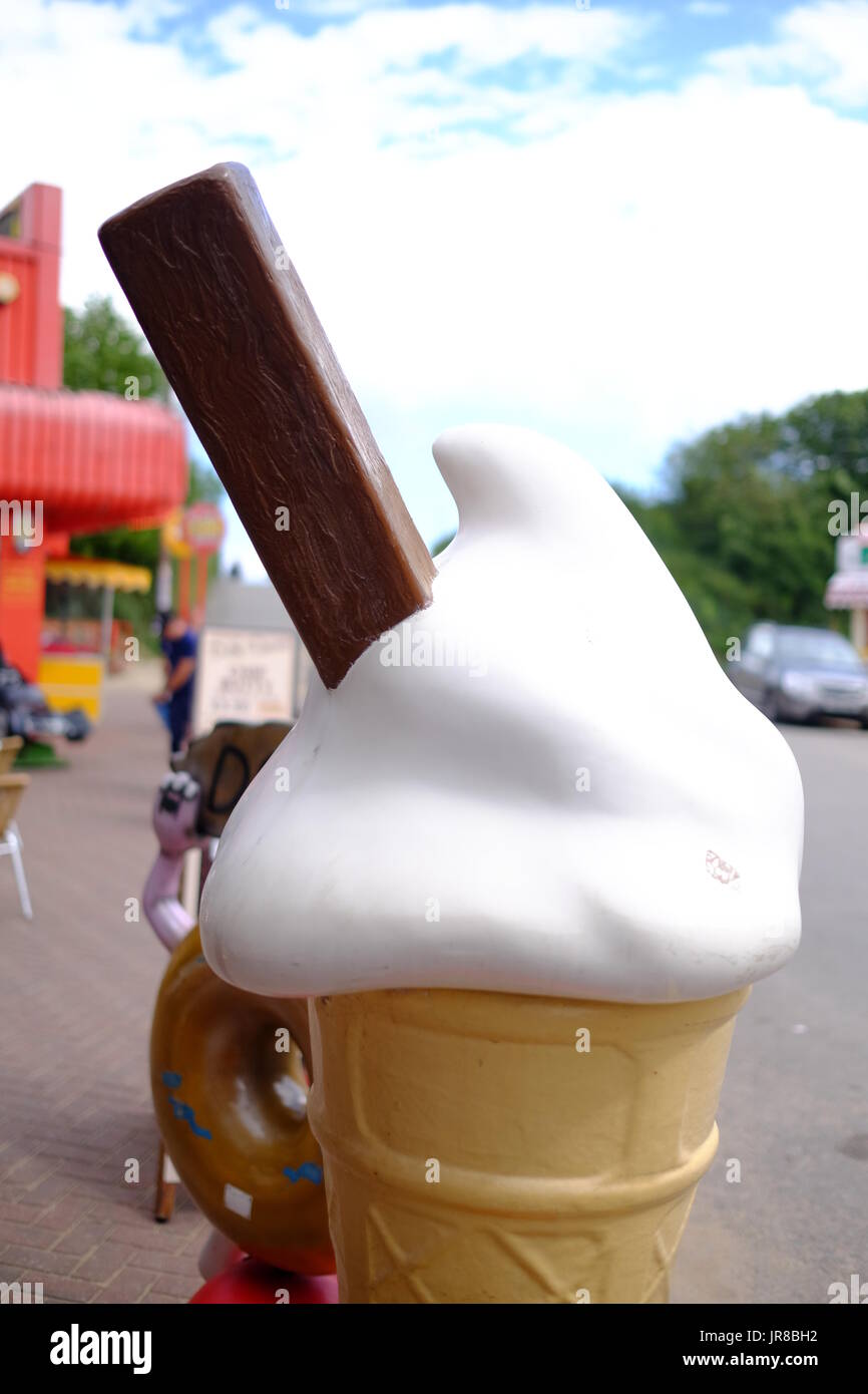 Giant ice cream with flake outside a seaside shop in Chapel St Leonards, Lincolnshire in the summer holidays. Stock Photo