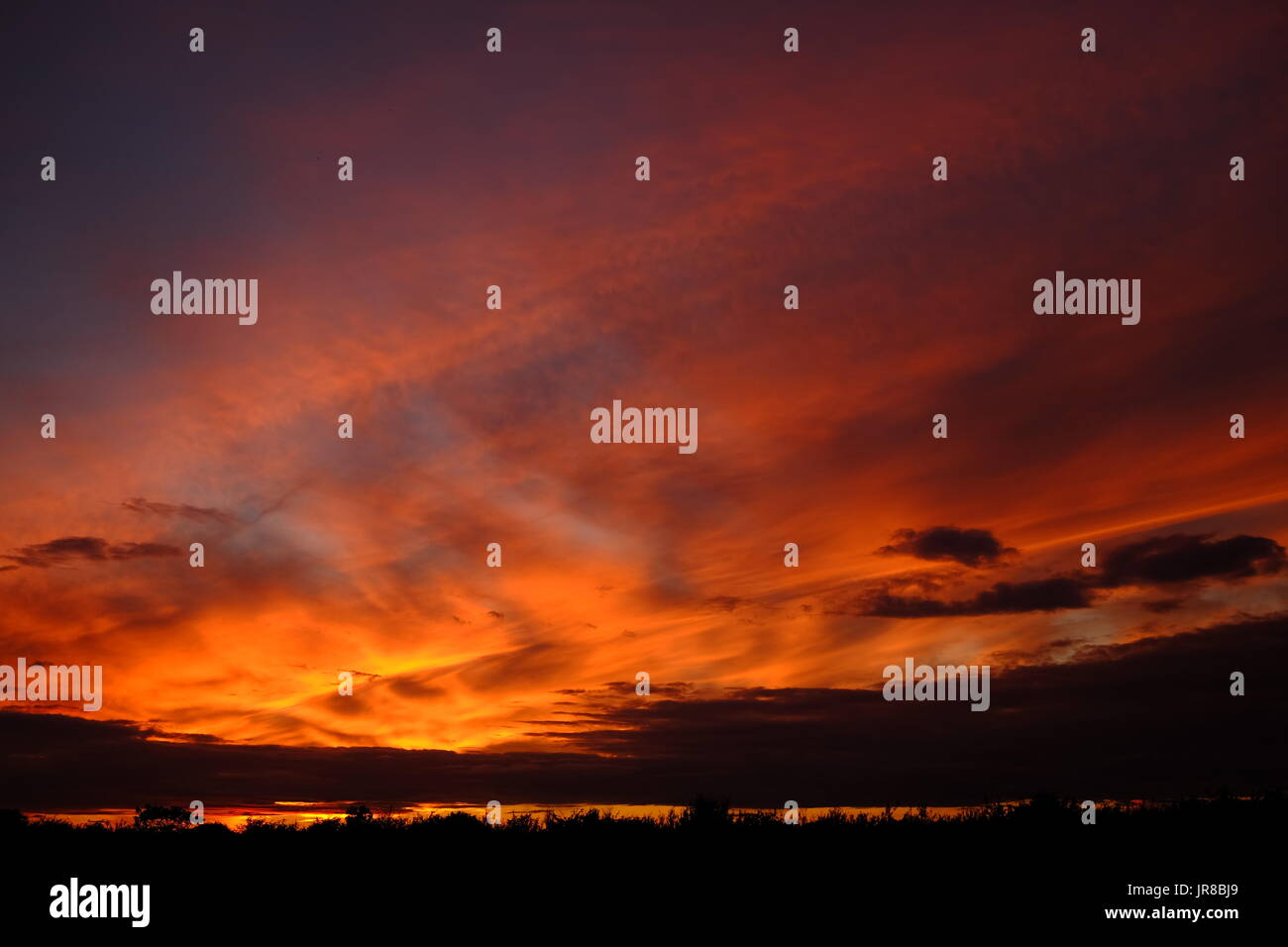 A spectacular August sunset over Chapel St Leonards in Lincolnshire Stock Photo