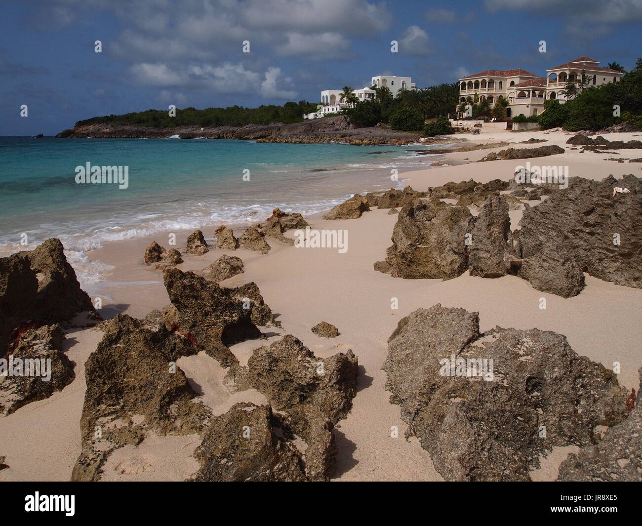 Limestone Bay beach and overlooking villas, Anguilla, BWI Stock Photo