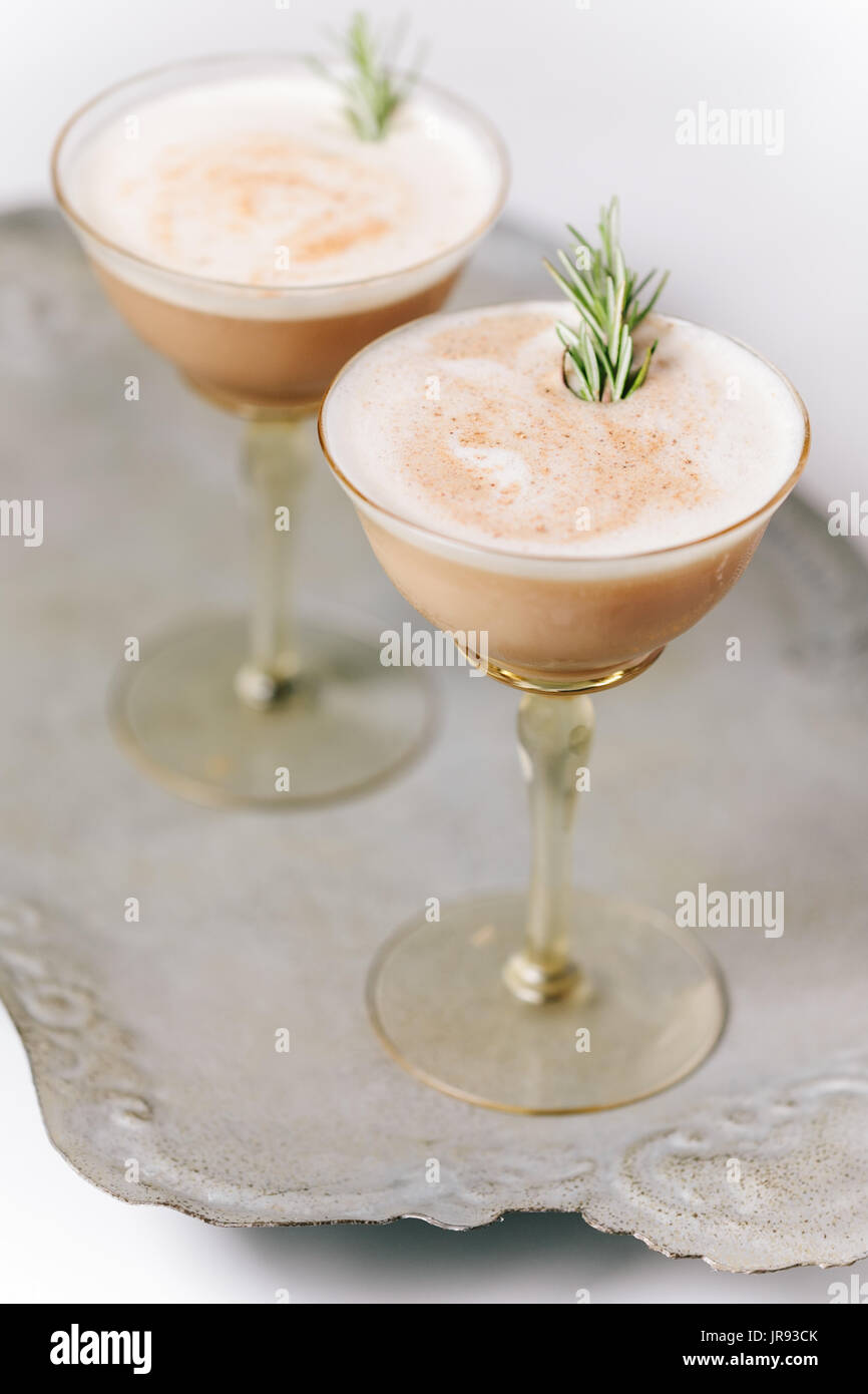 Chocolate Martini  Cocktail garnished with rosemary Stock Photo
