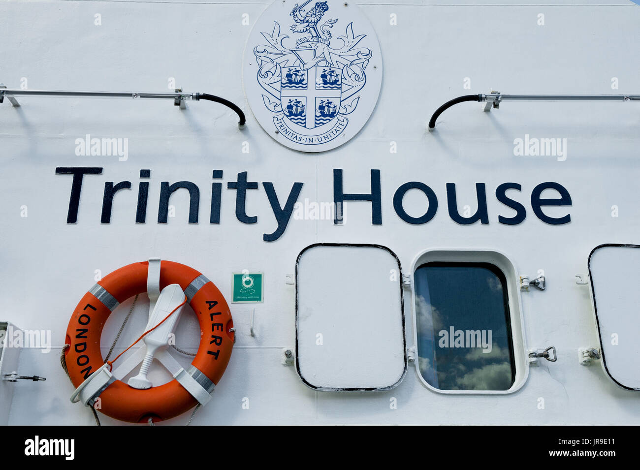 Trinity House motor vessel THV Alert and flag Stock Photo