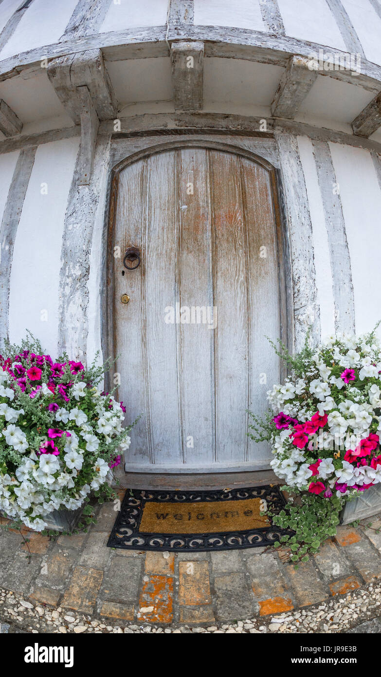 Timber framed house and door white washed. Stock Photo