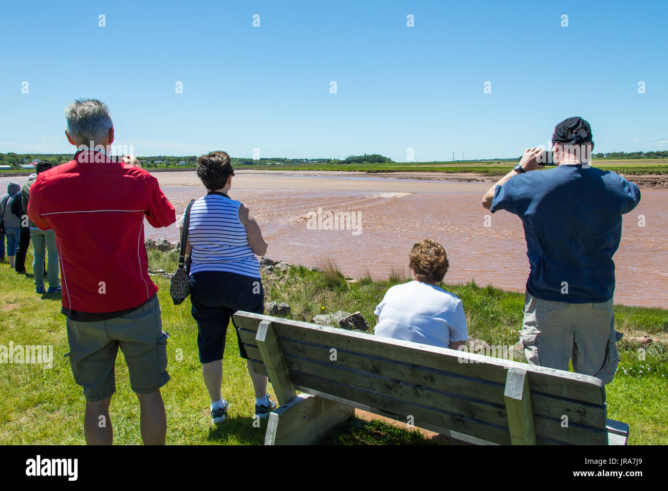 Tourists watching the Tidal Bore at the Viewing Visitor Centre, Nova Scotia, Canada Stock Photo