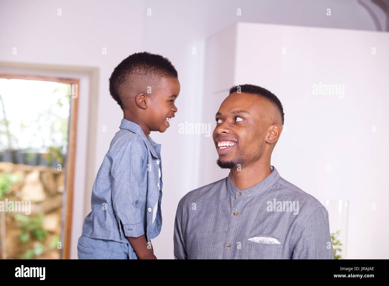 Father and son smiling Stock Photo