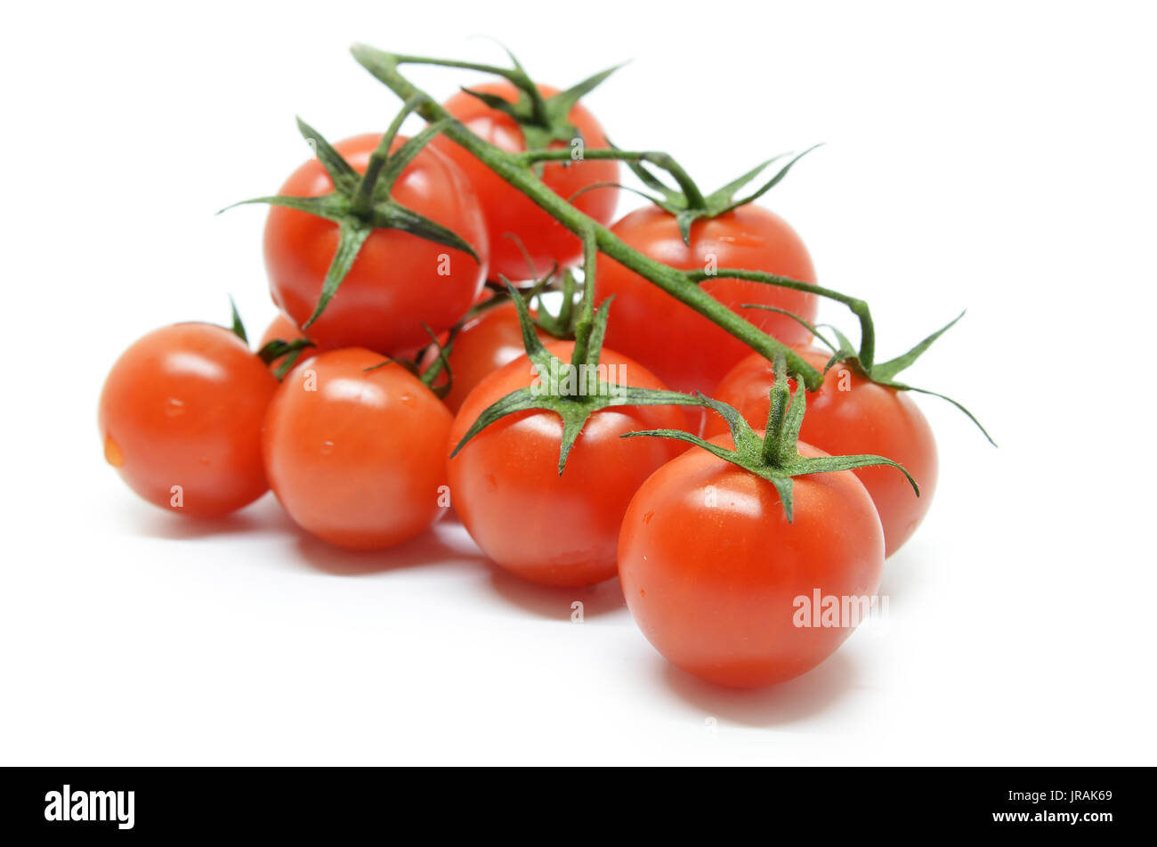 Red cherry tomato isolated on white background Stock Photo - Alamy