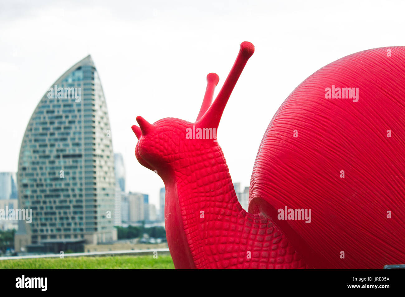 huge red snail Stock Photo