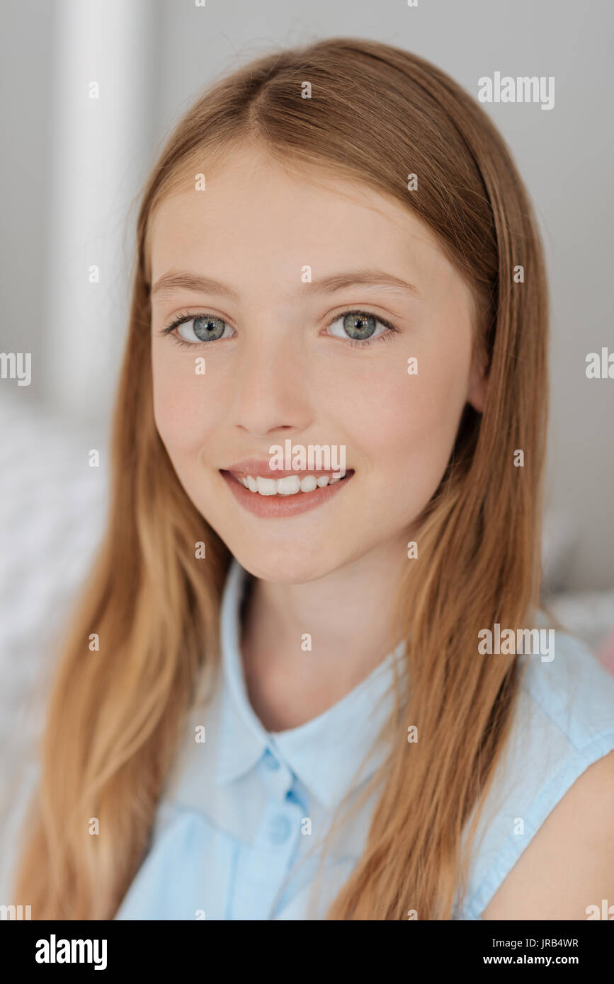 Pretty young lady smiling for camera Stock Photo Alamy