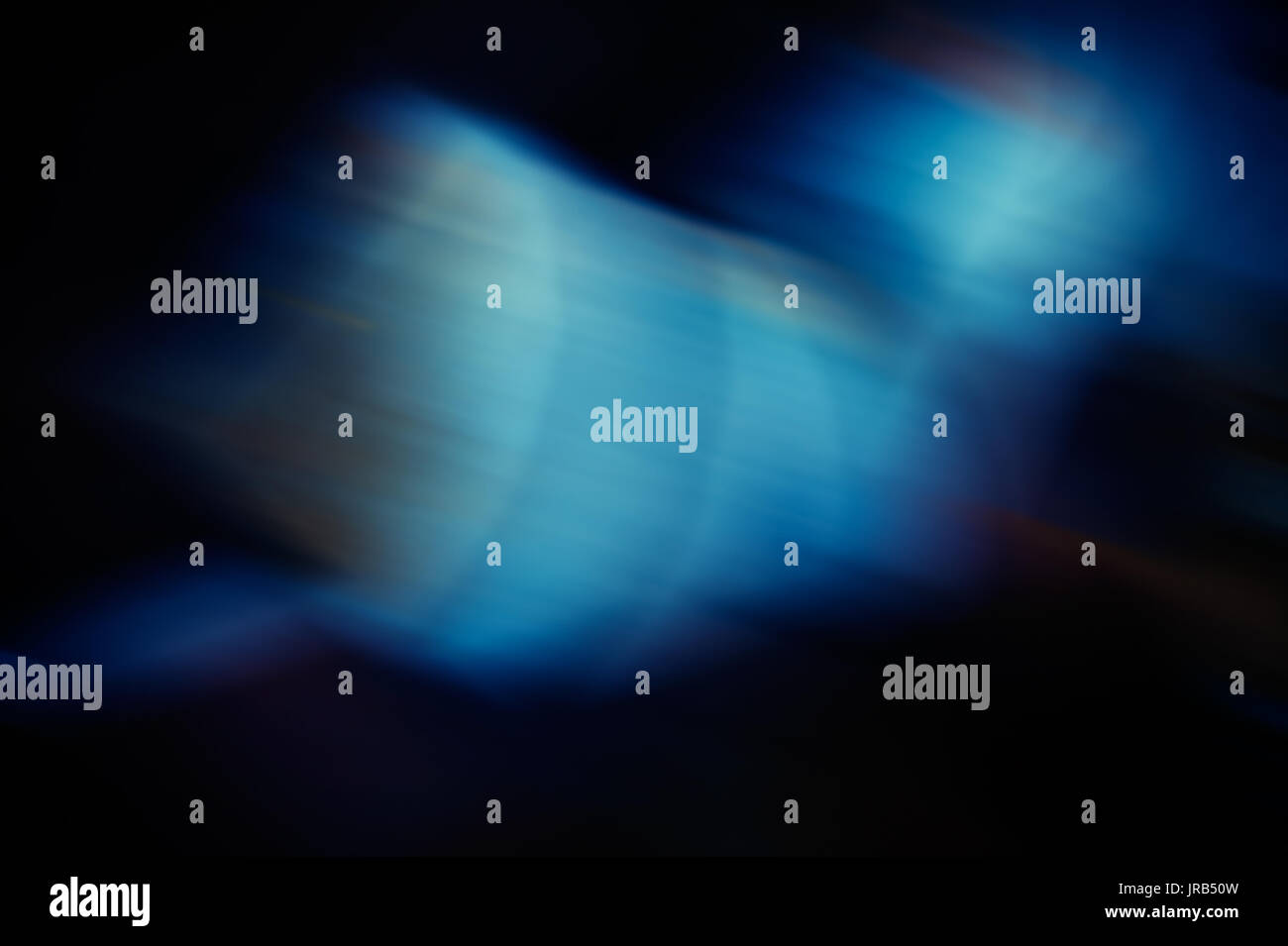 Abstract multicolored diagonal spots blurred background Stock Photo
