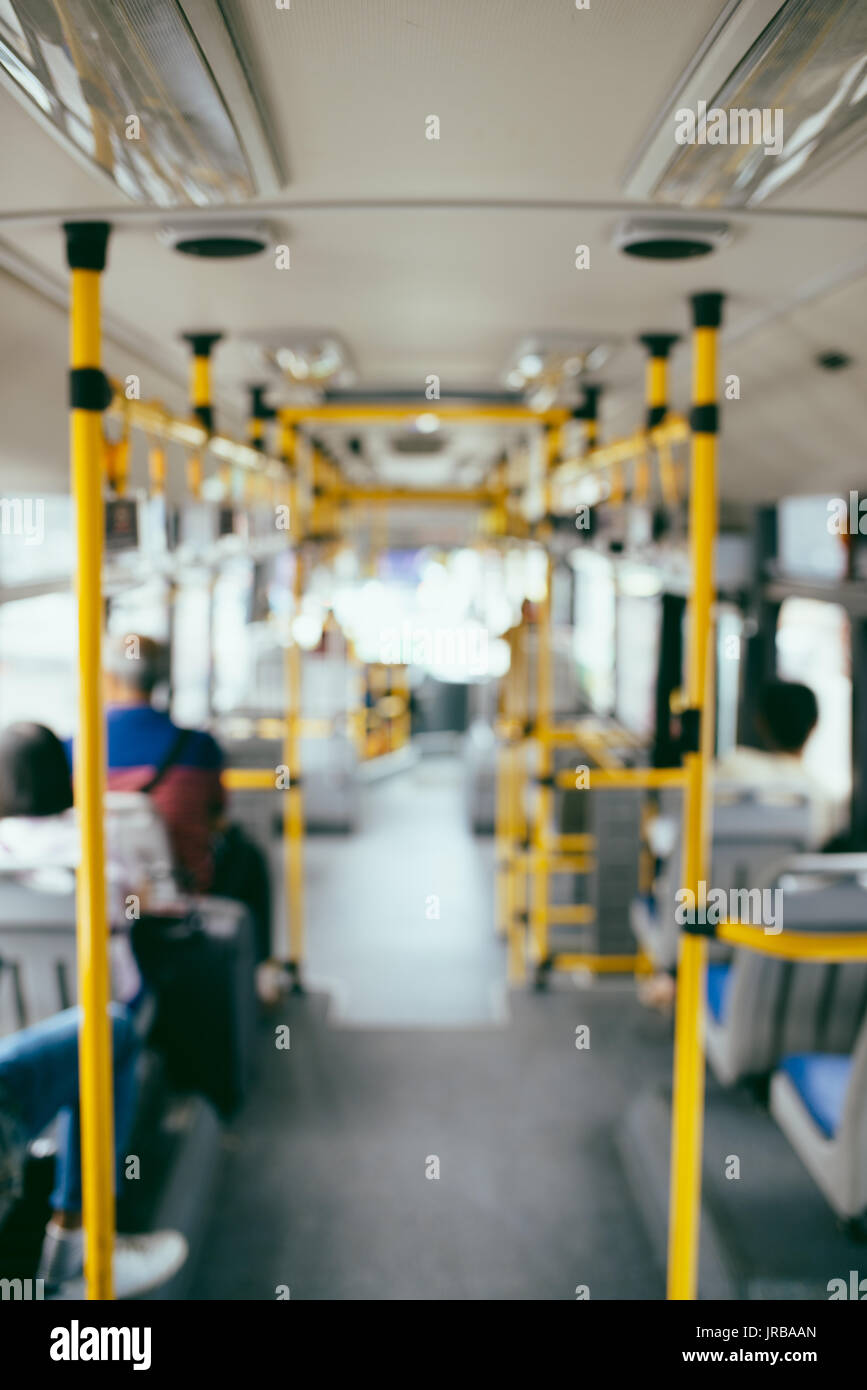 Public transportation. Blur image of interior of modern city bus Stock Photo
