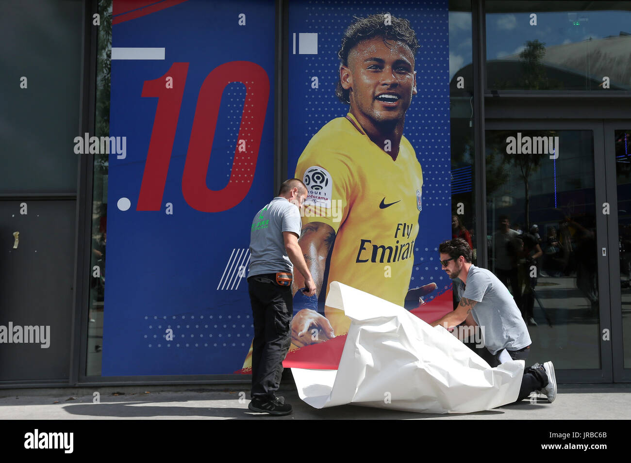 Paris Saint Germain Staff Unveil A Poster Of Neymar Outside The Club Stock Photo Alamy