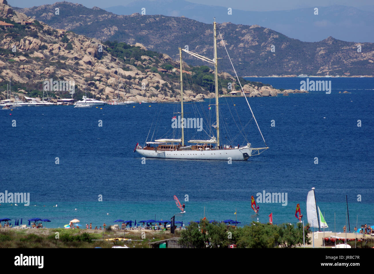 Palau, Sardinia. The mega yacht Chronos at anchor in Porto Rafel bay