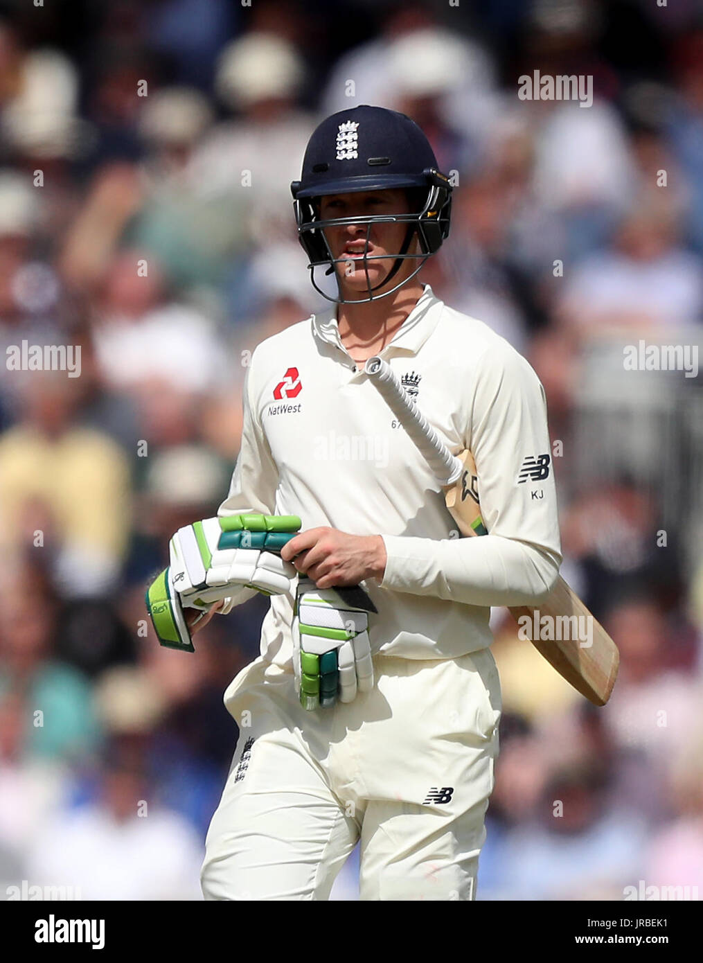 England's Keaton Jennings walks off after being dismissed during the Fourth Investec Test at Emirates Old Trafford, Manchester. Stock Photo