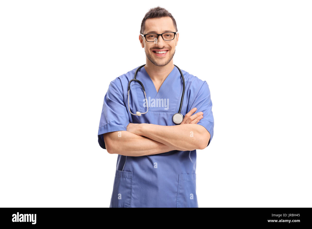 Doctor with his arms folded looking at the camera and smiling isolated on white background Stock Photo