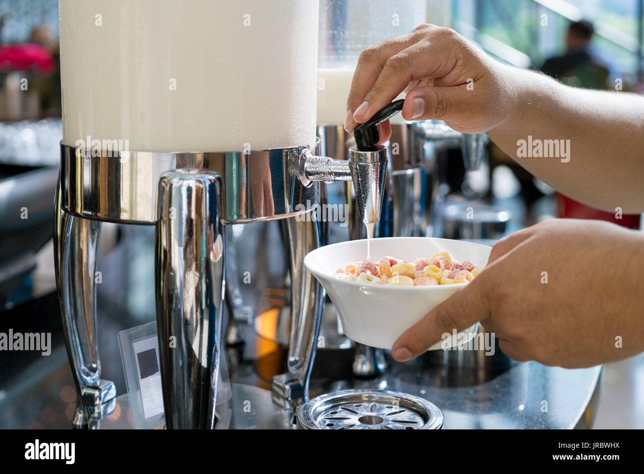 Cereals and fresh maik on the table in buffet breakfast in the restaurant. Healthy food. Stock Photo