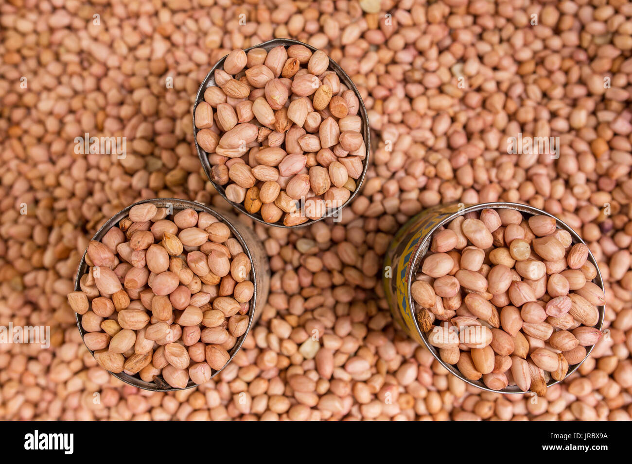 Roasted peanuts for sale on market. Food background Stock Photo Alamy