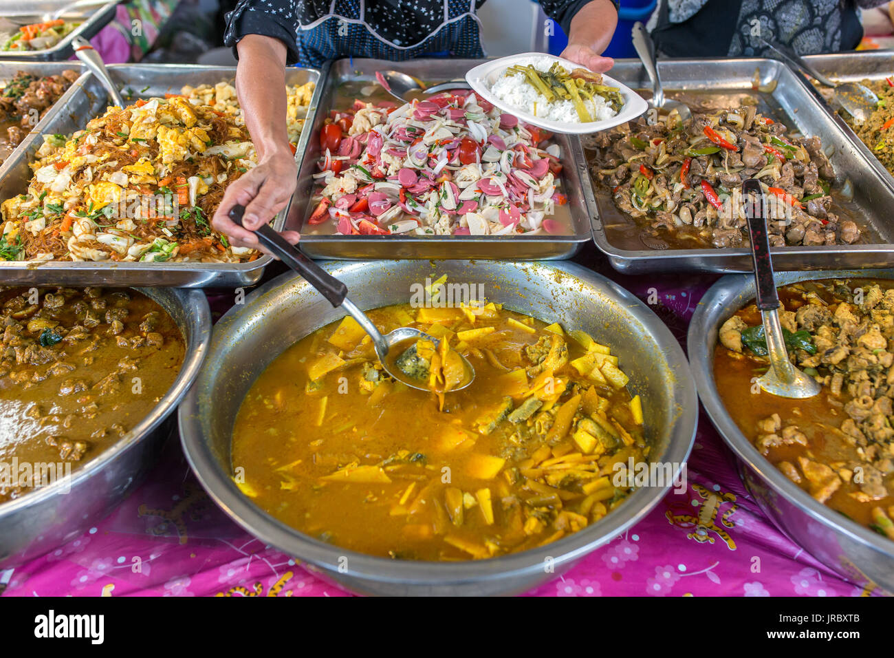 Variety of cooked food in Thai style fastfood buffet in Chiang Mai