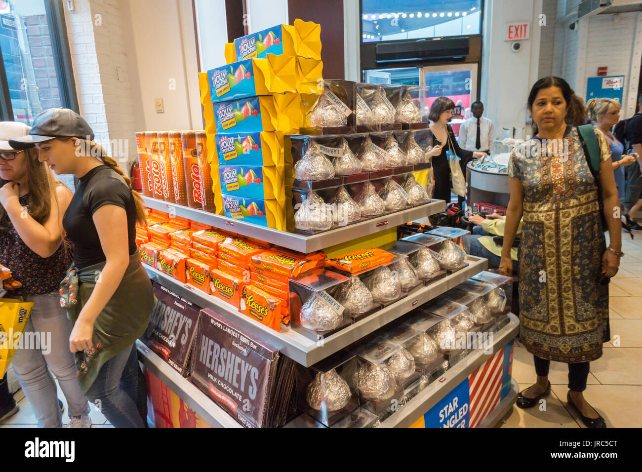 Tourists invade the Hershey Store in Times Square in New York on Thursday, July 27, 2017. The Hershey Co. recently reported second-quarter profit that beat analysts' expectations. Cost-cutting and the reinvention of products are cited. (© Richard B. Levine) Stock Photo