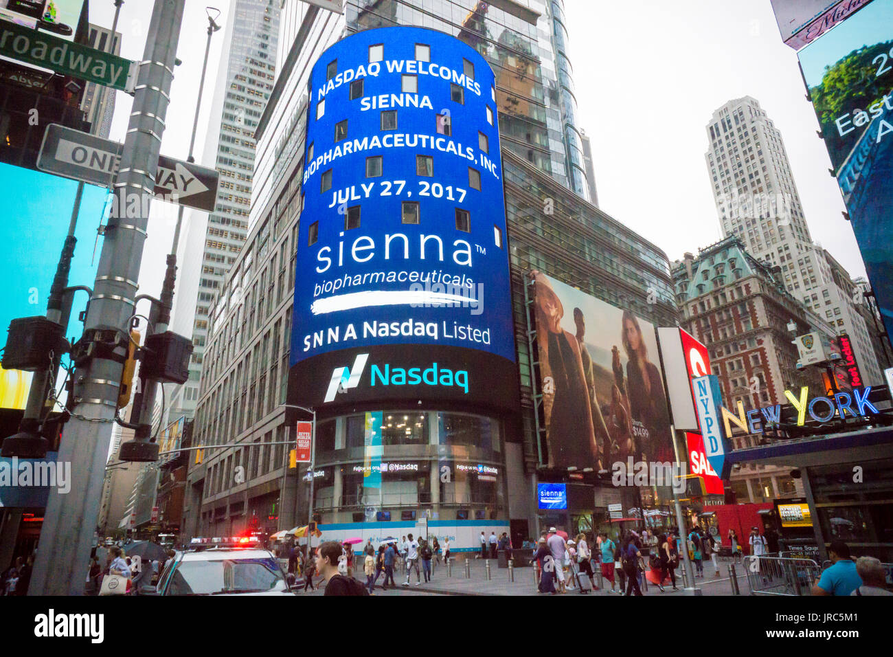 The digital display on NASDAQ advertises the recent initial public offering of Sienna Biopharmaceuticals on Thursday, July 27, 2017. The pharmaceutical company focuses on developing treatments for dermatological skin conditions and diseases. (© Richard B. Levine) Stock Photo